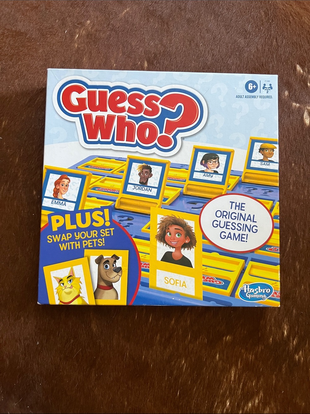 Hasbro Gaming Guess Who? Board Game, with People and Pets Cards, Ages 6 and up.